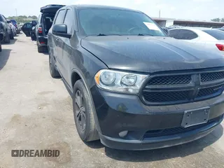 2013 Dodge Durango SXT z VIN 1C4RDHAG5DC693092, wystawiony jako IAAI lot #42062745 z przebiegiem 153 143 mil mil oraz . Historia ofert i sprzedaży dostępna na DreamBid. Obrazek 1.