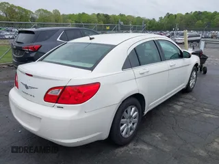 2010 Chrysler Sebring Touring with VIN 1C3CC4FB5AN229593, listed as a IAAI auction lot 41971326 with 144,561 mi miles and . Bid and sale history available at DreamBid. Image 4.