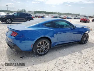 2024 Ford Mustang EcoBoost with VIN 1FA6P8TH7R5112306, listed as a Copart auction lot 58151055 with 4,467 mi miles and Salvage title. Bid and sale history available at DreamBid. Image 3.