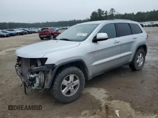 2012 Jeep Grand Cherokee Laredo with VIN 1C4RJFAG2CC294202, listed as a Copart auction lot 44918715 with 104,605 mi miles and Salvage Title. Bid and sale history available at carsss.com. Image 1.