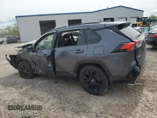 2023 Toyota RAV4 Hybrid SE with VIN JTM16RFVXPD088729, listed as a Copart auction lot 57879395 with 33,249 mi miles and Salvage title. Bid and sale history available at DreamBid. Image 2.