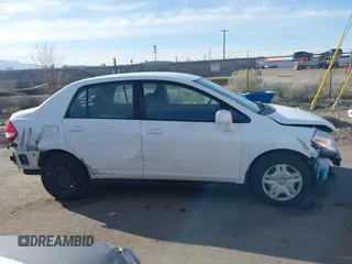 2010 Nissan Versa 1.8 S with VIN 3N1BC1AP8AL465537, listed as a IAAI auction lot 41762115 with 163,533 mi miles and . Bid and sale history available at carsss.com. Image 13.