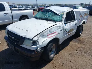 2002 Mazda B-Series Truck SX with VIN 4F4YR12D42TM16317, listed as a IAAI auction lot 41859988 with 220,933 mi miles and . Bid and sale history available at DreamBid. Image 6.
