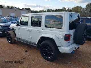 2021 Jeep Wrangler Unlimited Sahara with VIN 1C4JJXP64MW840094, listed as a IAAI auction lot 40830676 with 31,716 mi miles and . Bid and sale history available at DreamBid. Image 3.