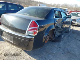 2006 Chrysler 300 with VIN 2C3LA43R96H121503, listed as a IAAI auction lot 41508552 with 296,393 mi miles. Bid and sale history available at carsss.com. Image 4.