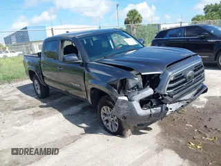 2019 Toyota Tacoma SR5 with VIN 3TMAZ5CN6KM112879, listed as a IAAI auction lot 42760296 with 57,493 mi miles and . Bid and sale history available at DreamBid. Image 1.