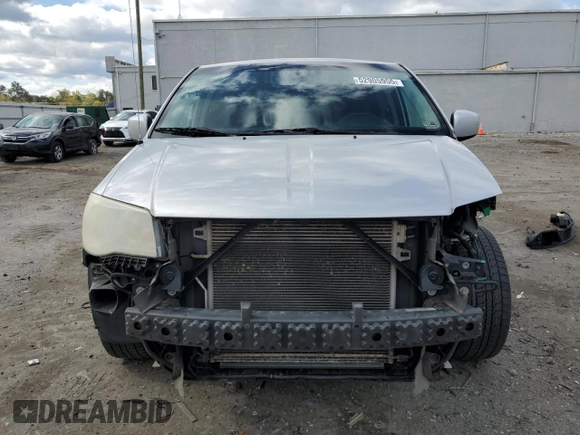 2012 Dodge Grand Caravan SXT with VIN 2C4RDGCG5CR327937, listed as a Copart auction lot 52905955 with 168,382 mi miles and Salvage Title. Bid and sale history available at DreamBid. Image 5.
