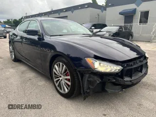 2015 Maserati Ghibli z VIN ZAM57XSA2F1159438, wystawiony jako Copart lot #49187735 z przebiegiem 73 996 mil mil oraz Szkoda całkowita • Salvage title. Historia ofert i sprzedaży dostępna na DreamBid. Obrazek 4.