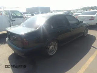 2000 BMW 5 Series 528i z VIN WBADM6347YGU09362, wystawiony jako IAAI lot #31257286 z przebiegiem Nie podano mil oraz . Historia ofert i sprzedaży dostępna na DreamBid. Obrazek 4.