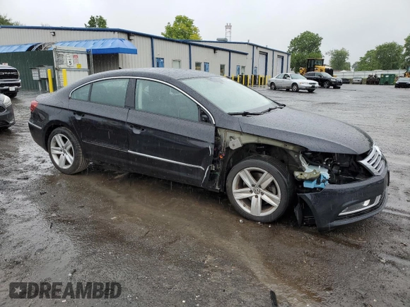 2013 Volkswagen CC Sport Plus with VIN WVWBP7AN6DE507128, listed as a Copart auction lot 56759035 with 77,140 mi miles and Salvage title. Bid and sale history available at DreamBid. Image 4.