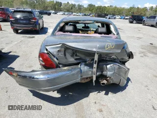 2004 Jaguar X-Type with VIN SAJEA51C04WD91344, listed as a Copart auction lot 49979285 with Not Provided miles and Salvage Title. Bid and sale history available at DreamBid. Image 6.