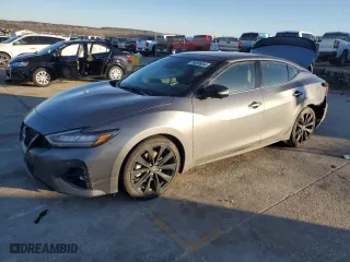 2023 Nissan Maxima SR with VIN 1N4AA6EV6PC513972, listed as a Copart auction lot 86695044 with 27,174 mi miles and Salvage Title. Bid and sale history available at carsss.com. Image 1.