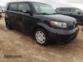2009 Scion xB with VIN JTLKE50E491063990, listed as a Copart auction lot 53448265 with 152,420 mi miles and Salvage Title. Bid and sale history available at DreamBid. Image 4.