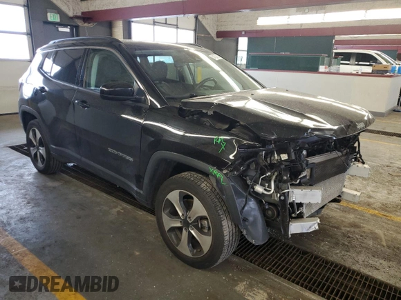 2020 Jeep Compass Latitude with VIN 3C4NJDBB3LT258349, listed as a Copart auction lot 61452715 with 80,933 mi miles and Salvage title. Bid and sale history available at DreamBid. Image 4.