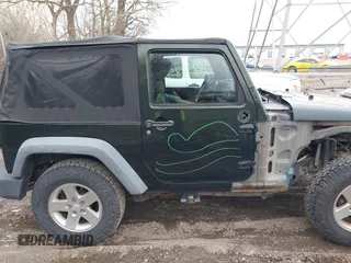 2011 Jeep Wrangler Sport with VIN 1J4AA2D18BL588273, listed as a IAAI auction lot 41857858 with 136,473 mi miles and . Bid and sale history available at carsss.com. Image 13.