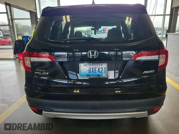 2021 Honda Pilot EX-L with VIN 5FNYF6H54MB073691, listed as a IAAI auction lot 42182875 with 115,550 mi miles. Bid and sale history available at carsss.com. Image 1.