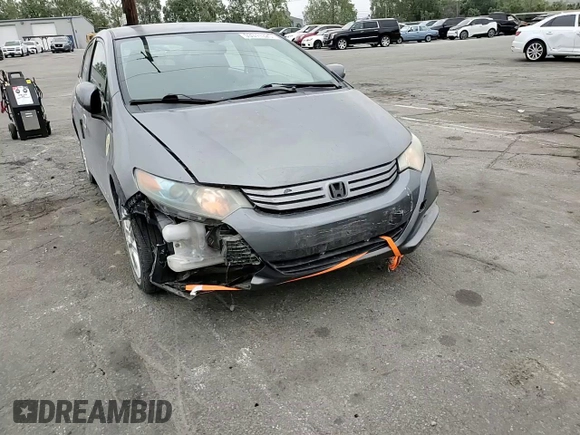 2010 Honda Insight EX with VIN JHMZE2H79AS017647, listed as a Copart auction lot 53311325 with 94,999 mi miles and Salvage Title. Bid and sale history available at DreamBid. Image 10.