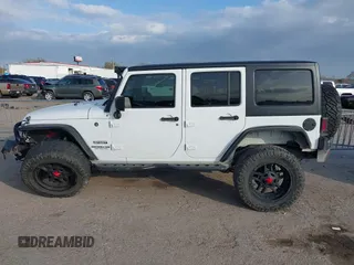 2017 Jeep Wrangler Unlimited Sport with VIN 1C4HJWDG1HL580136, listed as a IAAI auction lot 41193905 with 63,875 mi miles. Bid and sale history available at carsss.com. Image 14.
