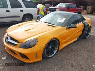 2003 Mercedes-Benz SL 500 with VIN WDBSK75F33F044194, listed as a IAAI auction lot 41982618 with Not provided miles and . Bid and sale history available at DreamBid. Image 2.