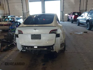 2021 Tesla Model Y Performance with VIN 5YJYGDEF4MF263473, listed as a IAAI auction lot 41851083 with 39,289 mi miles and . Bid and sale history available at DreamBid. Image 17.