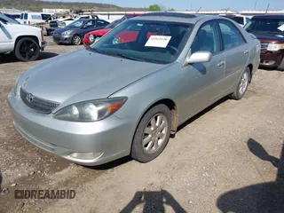 2003 Toyota Camry LE with VIN 4T1BE32K03U259171, listed as a IAAI auction lot 41912120 with 274,162 mi miles and . Bid and sale history available at DreamBid. Image 2.