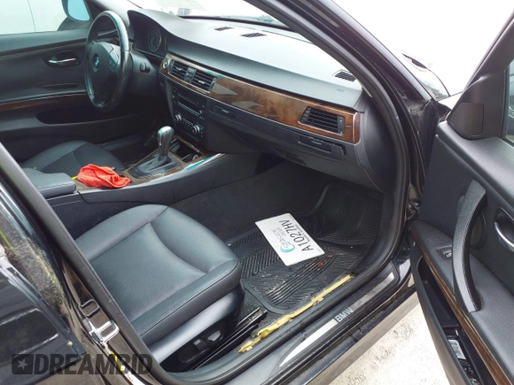 2009 BMW 3 Series 328i with VIN WBAPH775X9NM27054, listed as a IAAI auction lot 42449314 with 169,657 mi miles and . Bid and sale history available at DreamBid. Image 5.