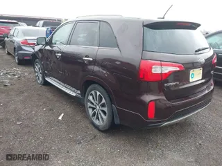 2014 Kia Sorento SX Limited with VIN 5XYKWDA77EG523043, listed as a IAAI auction lot 41017414 with 136,356 mi miles. Bid and sale history available at carsss.com. Image 3.