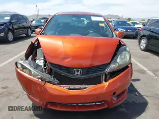 2012 Honda Fit Sport z VIN JHMGE8H57CC042178, wystawiony jako IAAI lot #42353989 z przebiegiem 115 911 mil mil oraz . Historia ofert i sprzedaży dostępna na DreamBid. Obrazek 6.