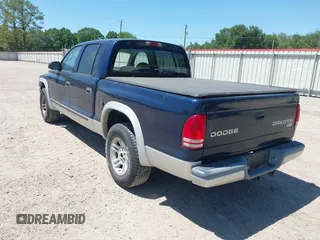 2003 Dodge Dakota SLT with VIN 1D7HL48N63S158682, listed as a IAAI auction lot 41964332 with 278,390 mi miles. Bid and sale history available at carsss.com. Image 3.