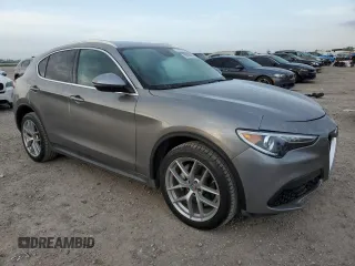2018 Alfa Romeo Stelvio z VIN ZASFAKAN9J7B88059, wystawiony jako Copart lot #50894085 z przebiegiem 94 280 mil mil oraz Czysty tytuł • Clean title. Historia ofert i sprzedaży dostępna na DreamBid. Obrazek 4.