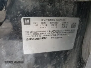 2014 Cadillac CTS AWD with VIN 1G6AW5SX6E0142793, listed as a Copart auction lot 43312545 with 101,124 mi miles and Salvage title. Bid and sale history available at DreamBid. Image 14.