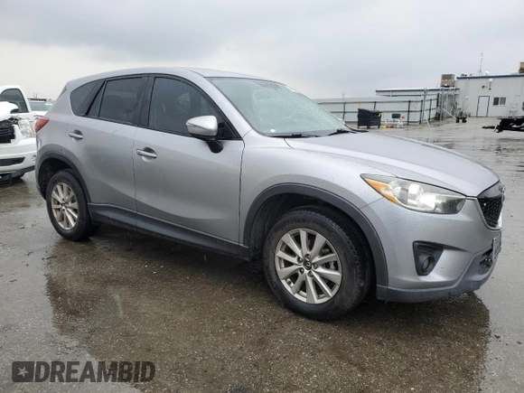 2015 Mazda CX-5 Touring with VIN JM3KE2CY4F0469096, listed as a Copart auction lot 48075105 with 131,788 mi miles and Salvage Title. Bid and sale history available at carsss.com. Image 4.