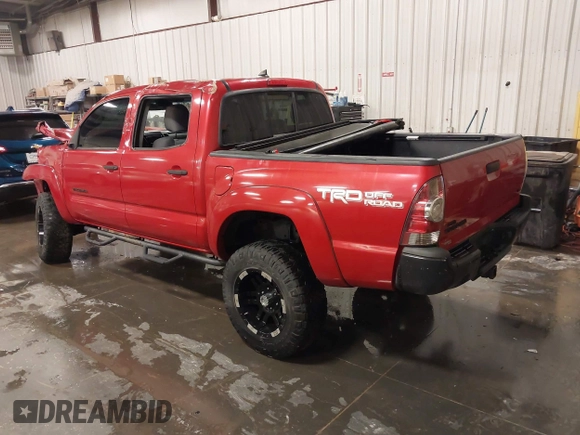2015 Toyota Tacoma with VIN 3TMLU4EN3FM196518, listed as a IAAI auction lot 41198481 with 96,277 mi miles and . Bid and sale history available at DreamBid. Image 3.