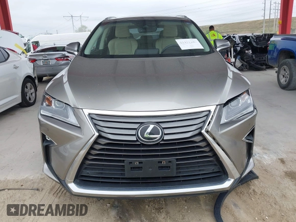 2018 Lexus RX 350 z VIN 2T2BZMCA3JC151296, wystawiony jako IAAI lot #41331203 z przebiegiem 73 051 mil mil oraz . Historia ofert i sprzedaży dostępna na DreamBid. Obrazek 12.