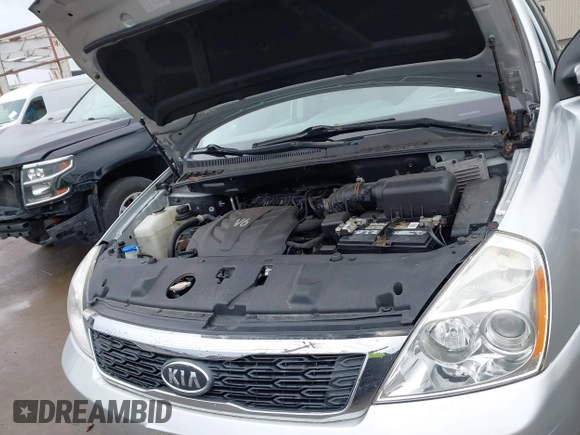 2012 Kia Sedona LX with VIN KNDMG4C72C6485952, listed as a IAAI auction lot 42029147 with 129,296 mi miles. Bid and sale history available at carsss.com. Image 10.