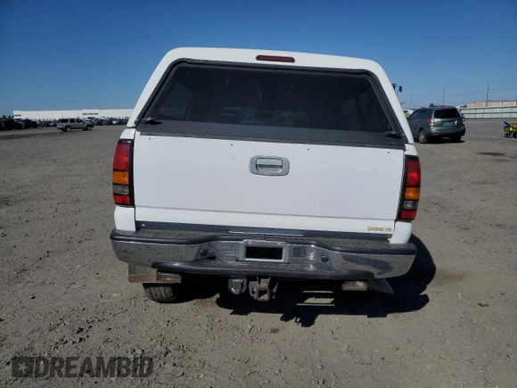 2005 GMC Sierra 1500 with VIN 1GTHC29215E161722, listed as a Copart auction lot 53283965 with 112,857 mi miles and Salvage Title. Bid and sale history available at DreamBid. Image 6.