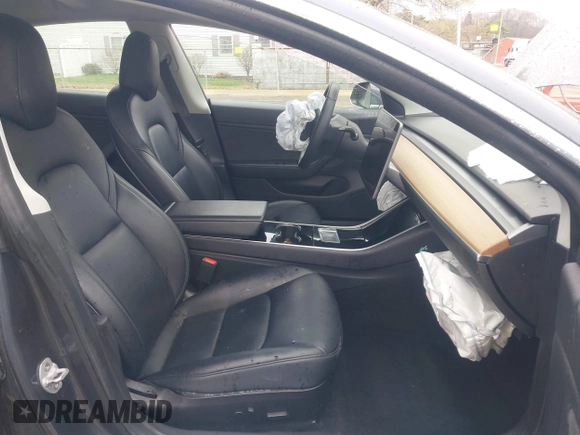 2020 Tesla Model 3 Performance z VIN 5YJ3E1EC9LF601713, wystawiony jako IAAI lot #41888617 z przebiegiem 70 517 mil mil oraz . Historia ofert i sprzedaży dostępna na DreamBid. Obrazek 5.