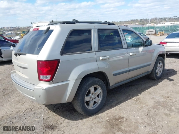 2007 Jeep Grand Cherokee Laredo with VIN 1J8GR48KX7C513145, listed as a IAAI auction lot 41994486 with 188,870 mi miles. Bid and sale history available at carsss.com. Image 4.