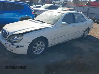 2002 Mercedes-Benz S-Class 4.3L with VIN WDBNG70J52A275068, listed as a IAAI auction lot 41570286 with 123,211 mi miles. Bid and sale history available at carsss.com. Image 2.