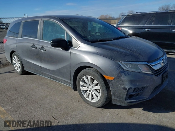 2019 Honda Odyssey LX with VIN 5FNRL6H21KB057139, listed as a IAAI auction lot 41422185 with 128,812 mi miles and . Bid and sale history available at DreamBid. Image 1.