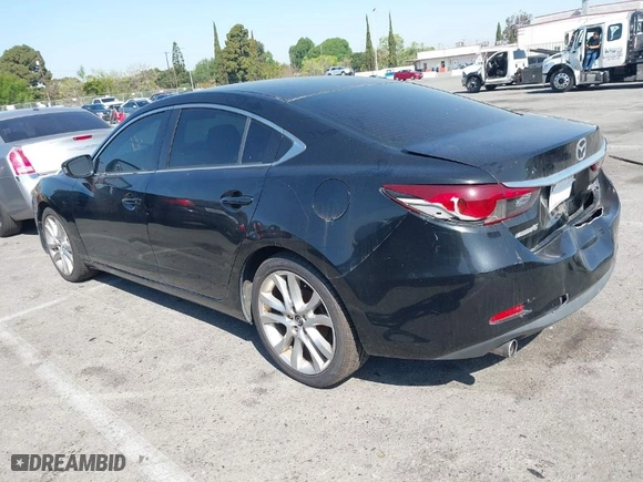 2014 Mazda Mazda6 i Touring with VIN JM1GJ1V69E1155386, listed as a IAAI auction lot 41973800 with 250,808 mi miles. Bid and sale history available at carsss.com. Image 3.