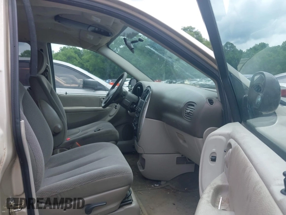 2005 Chrysler Town & Country Touring z VIN 2C8GP54L25R491310, wystawiony jako IAAI lot #42363567 z przebiegiem 203 608 mil mil oraz . Historia ofert i sprzedaży dostępna na DreamBid. Obrazek 5.