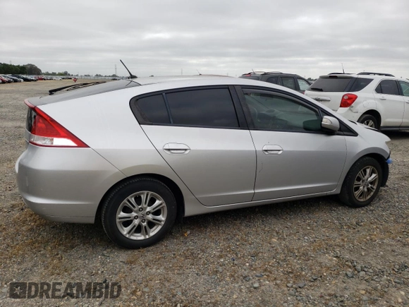 2010 Honda Insight EX with VIN JHMZE2H71AS039108, listed as a Copart auction lot 54557145 with 151,230 mi miles and Salvage title. Bid and sale history available at DreamBid. Image 3.