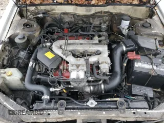 1990 Nissan Maxima z VIN JN1HJ01P4LT450350, wystawiony jako Copart lot #45054615 z przebiegiem 225 239 mil mil oraz Tytuł czysty. Historia ofert i sprzedaży dostępna na DreamBid. Obrazek 11.