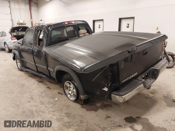 2001 Toyota Tundra SR5 with VIN 5TBRT34131S169696, listed as a IAAI auction lot 41481456 with 215,679 mi miles and . Bid and sale history available at DreamBid. Image 3.