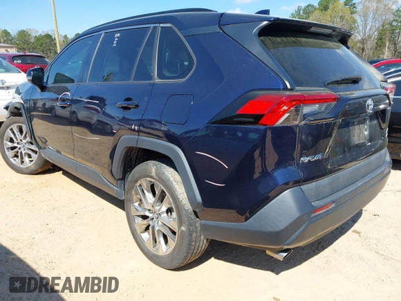 2019 Toyota RAV4 XLE Premium with VIN 2T3A1RFV4KW078806, listed as a IAAI auction lot 41877504 with 99,017 mi miles. Bid and sale history available at carsss.com. Image 3.