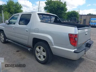 2013 Honda Ridgeline RTL with VIN 5FPYK1F51DB007236, listed as a IAAI auction lot 42762126 with 201,758 mi miles and . Bid and sale history available at DreamBid. Image 3.