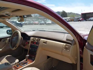 2000 Mercedes-Benz E-Class with VIN WDBJF65J1YB018240, listed as a IAAI auction lot 42051187 with 186,651 mi miles. Bid and sale history available at carsss.com. Image 5.