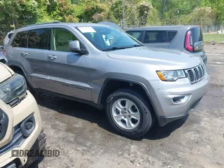 2017 Jeep Grand Cherokee Altitude with VIN 1C4RJEAG6HC647333, listed as a IAAI auction lot 42071820 with 129,740 mi miles and . Bid and sale history available at DreamBid. Image 1.