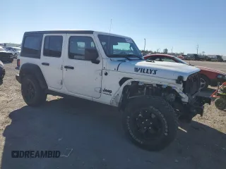 2022 Jeep Wrangler Unlimited High Tide with VIN 1C4HJXDG2NW102145, listed as a Copart auction lot 41407225 with 43,921 mi miles and Salvage Title. Bid and sale history available at DreamBid. Image 4.